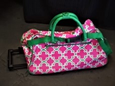  PINK AND GREEN ROLLING  DUFFLE BAG