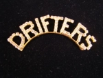 DRIFTERS Gold Plated Arched Swarovski Crystal Lapel Pin-On back order